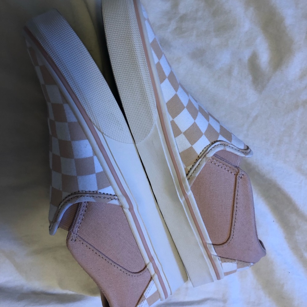 Hey!I am selling a pair of sandy pink slip on vans